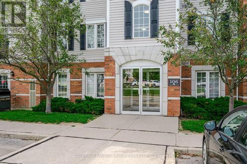 209 - 106 Aspen Springs Drive, Clarington (Bowmanville), ON - Outdoor With Facade