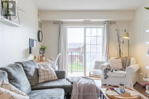 209 - 106 Aspen Springs Drive, Clarington (Bowmanville), ON - Indoor Photo Showing Living Room