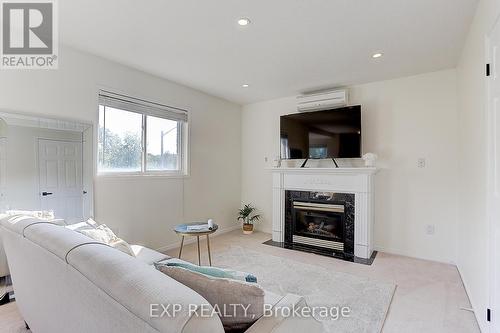 2044 Wilson Street, Innisfil (Alcona), ON - Indoor With Fireplace