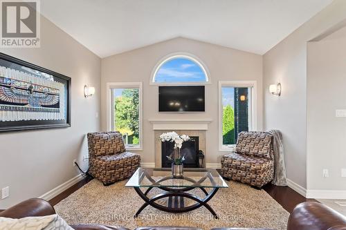 1423 Howlett Circle, London, ON - Indoor Photo Showing Living Room With Fireplace