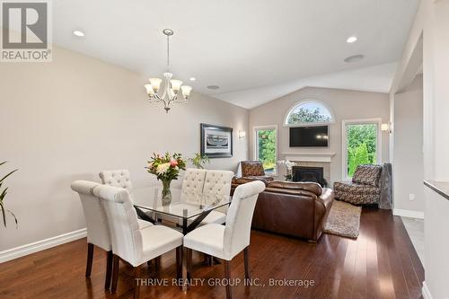 1423 Howlett Circle, London, ON - Indoor Photo Showing Dining Room With Fireplace