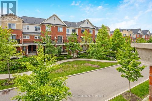 22 - 2500 Post Road, Oakville (Uptown Core), ON - Outdoor With Facade