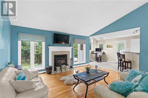 32 Sawgrass Circle, Ottawa, ON - Indoor Photo Showing Living Room With Fireplace