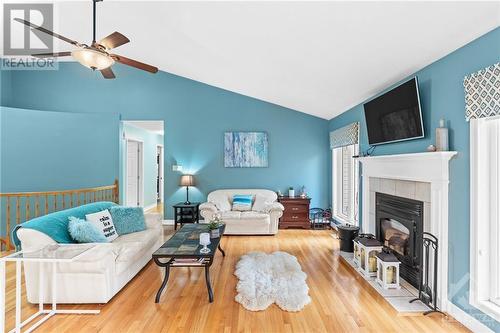 32 Sawgrass Circle, Ottawa, ON - Indoor Photo Showing Living Room With Fireplace