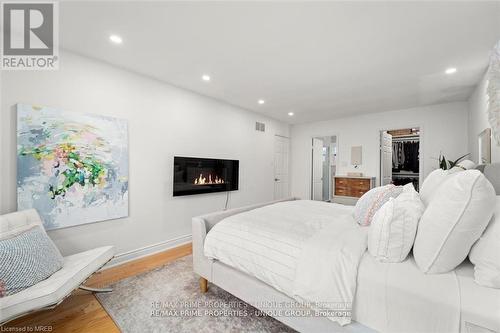 293 Mississaga Street, Oakville (Bronte West), ON - Indoor Photo Showing Bedroom With Fireplace