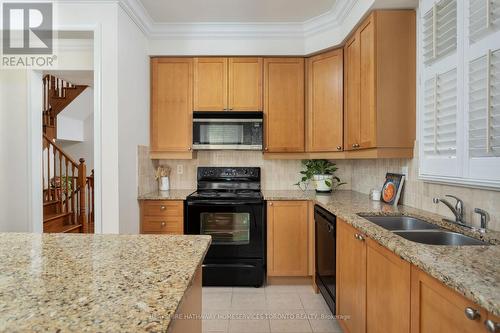 24 Yates Avenue, Toronto, ON - Indoor Photo Showing Kitchen With Double Sink