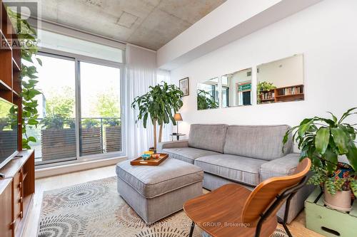 202 - 1190 Dundas Street E, Toronto (South Riverdale), ON - Indoor Photo Showing Living Room