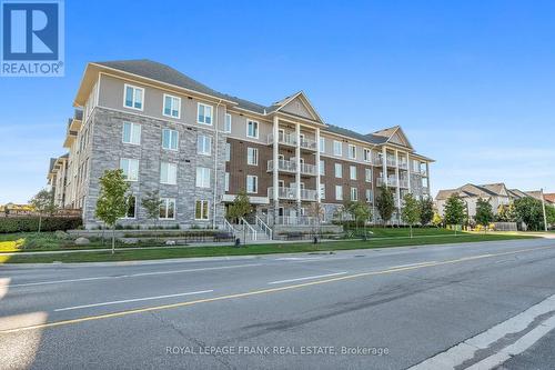 218 - 290 Liberty Street N, Clarington (Bowmanville), ON - Outdoor With Facade