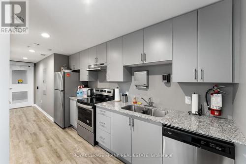 218 - 290 Liberty Street N, Clarington (Bowmanville), ON - Indoor Photo Showing Kitchen With Stainless Steel Kitchen With Double Sink With Upgraded Kitchen