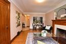 122 Haddon Avenue S, Hamilton, ON  - Indoor Photo Showing Living Room With Fireplace 