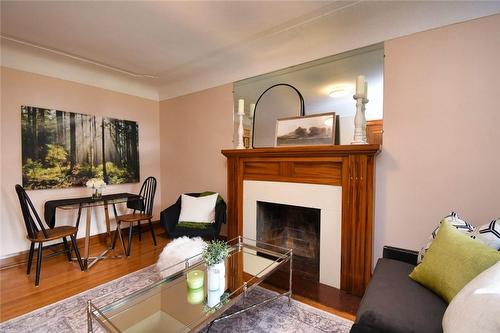 122 Haddon Avenue S, Hamilton, ON - Indoor Photo Showing Living Room With Fireplace