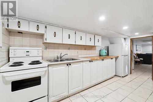 8 Beaver Avenue, Toronto (Dovercourt-Wallace Emerson-Junction), ON - Indoor Photo Showing Kitchen With Double Sink