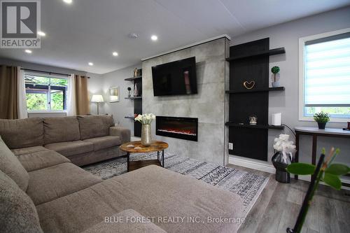 371 Sherwood Avenue, Central Elgin (Belmont), ON - Indoor Photo Showing Living Room With Fireplace