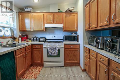 123 - 2189 Dundas Street, London, ON - Indoor Photo Showing Kitchen With Double Sink