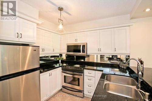 404 - 95 Prince Arthur Avenue, Toronto (Annex), ON - Indoor Photo Showing Kitchen With Stainless Steel Kitchen With Double Sink