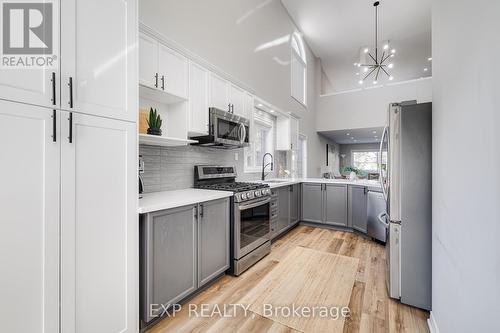 7 - 3045 New Street, Burlington, ON - Indoor Photo Showing Kitchen With Upgraded Kitchen