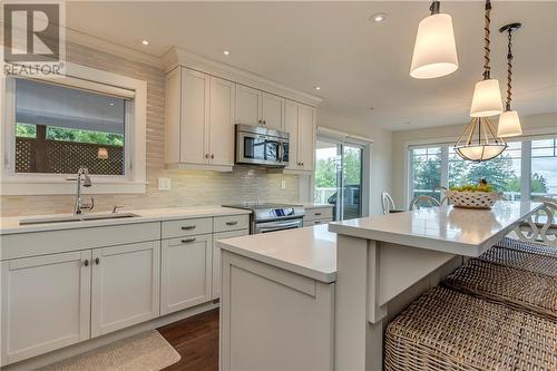 28 Helene Road, Grande-Digue, NB - Indoor Photo Showing Kitchen With Double Sink