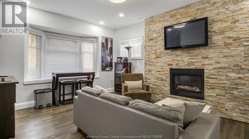 1165 Ouellette Avenue, Windsor, ON - Indoor Photo Showing Living Room With Fireplace