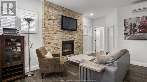 1165 Ouellette Avenue, Windsor, ON - Indoor Photo Showing Living Room With Fireplace