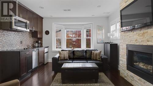 1165 Ouellette Avenue, Windsor, ON - Indoor Photo Showing Living Room With Fireplace