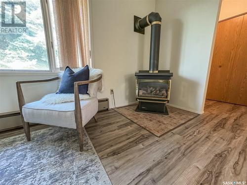 100 Ebenal Way, Mclean, SK - Indoor With Fireplace