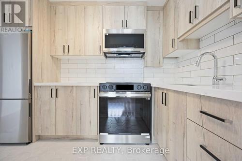 507 - 3621 Lake Shore Boulevard W, Toronto (Long Branch), ON - Indoor Photo Showing Kitchen