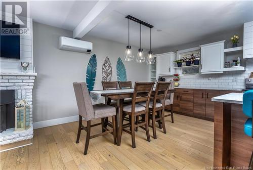 215 Gaspe, Dieppe, NB - Indoor Photo Showing Dining Room With Fireplace