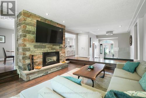 9 Green Pine Avenue, Springwater (Midhurst), ON - Indoor Photo Showing Living Room With Fireplace