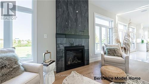 96 Hilborn Street, Blandford-Blenheim, ON - Indoor Photo Showing Living Room With Fireplace