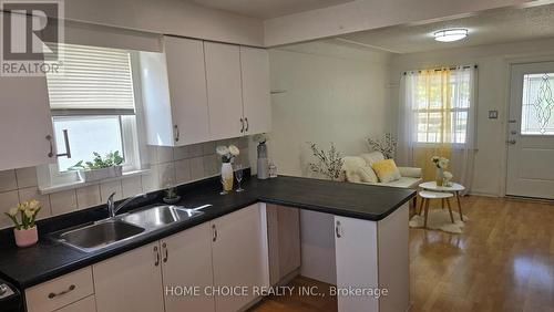 558 Quebec Street, Hamilton (Parkview), ON - Indoor Photo Showing Kitchen With Double Sink