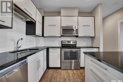 109 502 Perehudoff Crescent, Saskatoon, SK - Indoor Photo Showing Kitchen With Double Sink With Upgraded Kitchen