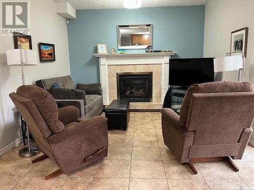 2219 Mahony Crescent, Regina, SK - Indoor Photo Showing Living Room With Fireplace