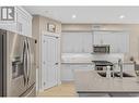 9563 Jensen Road Unit# 403, Lake Country, BC  - Indoor Photo Showing Kitchen With Double Sink With Upgraded Kitchen 