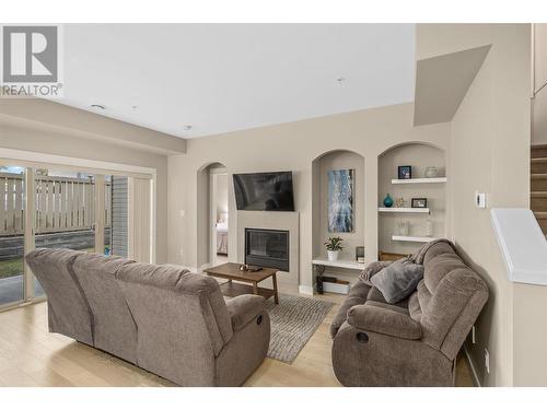 9563 Jensen Road Unit# 403, Lake Country, BC - Indoor Photo Showing Living Room With Fireplace