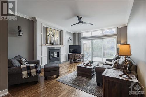 3448 Paul Anka Drive, Ottawa, ON - Indoor Photo Showing Living Room With Fireplace