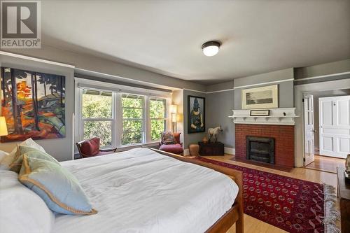 9 Park Crescent, Fernie, BC - Indoor Photo Showing Bedroom With Fireplace