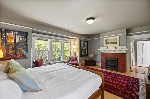 9 Park Crescent, Fernie, BC - Indoor Photo Showing Bedroom With Fireplace