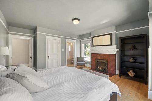 9 Park Crescent, Fernie, BC - Indoor Photo Showing Bedroom With Fireplace