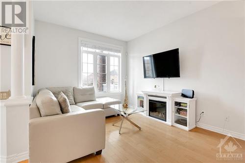 Pictures taken fm previous occupant. - 330 Royal Fern Way, Ottawa, ON - Indoor Photo Showing Living Room With Fireplace