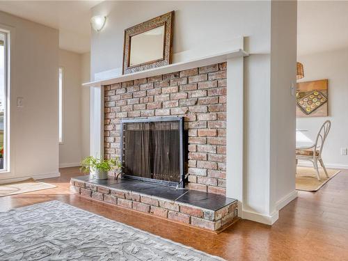 311-2250 Manor Pl, Comox, BC - Indoor Photo Showing Living Room With Fireplace