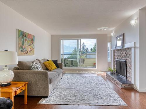 311-2250 Manor Pl, Comox, BC - Indoor Photo Showing Living Room With Fireplace