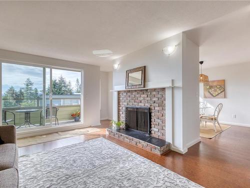 311-2250 Manor Pl, Comox, BC - Indoor Photo Showing Living Room With Fireplace