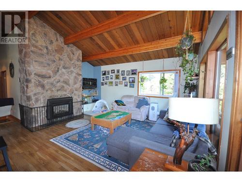 1710 South Lakeside Drive, Williams Lake, BC - Indoor Photo Showing Living Room With Fireplace