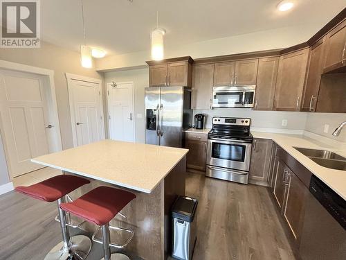 307 11205 105 Avenue, Fort St. John, BC - Indoor Photo Showing Kitchen With Double Sink