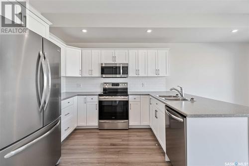 13 301 Centennial Road, Hague, SK - Indoor Photo Showing Kitchen With Double Sink