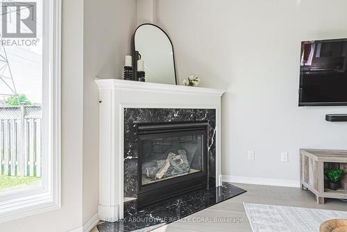 2268 Greenway Terrace, Burlington (Rose), ON - Indoor Photo Showing Living Room With Fireplace