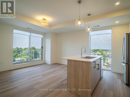 705 - 118 West Street, Port Colborne, ON - Indoor Photo Showing Kitchen With Double Sink