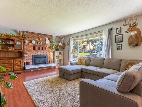 8 Breccia Drive, Logan Lake, BC - Indoor Photo Showing Living Room With Fireplace