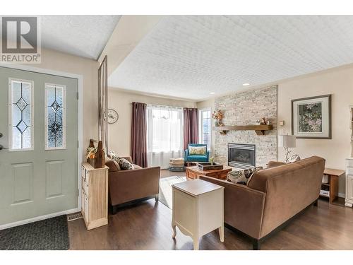 5487 Heyer Road, Prince George, BC - Indoor Photo Showing Living Room With Fireplace