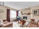 5487 Heyer Road, Prince George, BC  - Indoor Photo Showing Living Room With Fireplace 